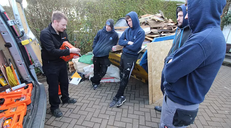 staff watching demonstration