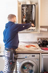 helping to fix boiler