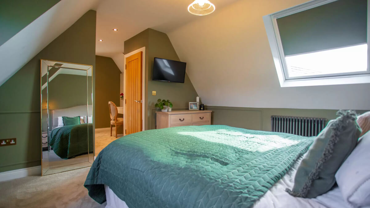 Green bedroom furnished